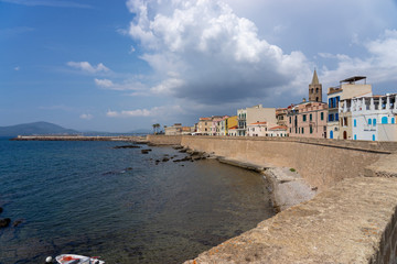 Fototapeta na wymiar Embankment and town wall of Alghero. Sardinia, Italy