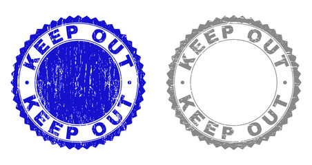 Grunge KEEP OUT stamp seals isolated on a white background. Rosette seals with grunge texture in blue and gray colors. Vector rubber stamp imitation of KEEP OUT title inside round rosette.