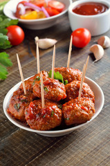 Tasty meatballs in white bowl