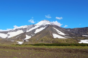 Fototapeta premium View of Avachinsky volcano. Avachinsky (also known as Avacha or Avacha Volcano or Avachinskaya Sopka) is an active stratovolcano on the Kamchatka Peninsula in the far east of Russia.