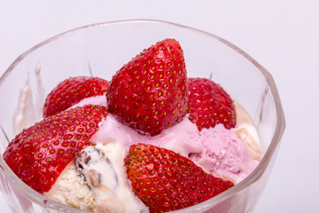 ice cream and fresh ripe strawberries  isolated on white background