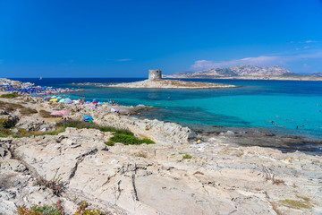 Fototapeta na wymiar View of Pelosa beach with old Aragonese tower, Sardinia, Italy