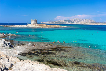 View of Pelosa beach with old Aragonese tower, Sardinia, Italy