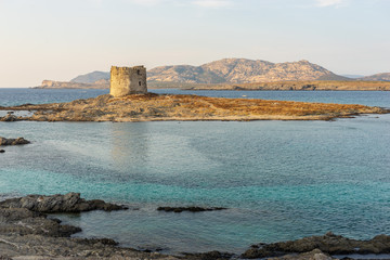 View of Pelosa beach with old Aragonese tower, Sardinia, Italy