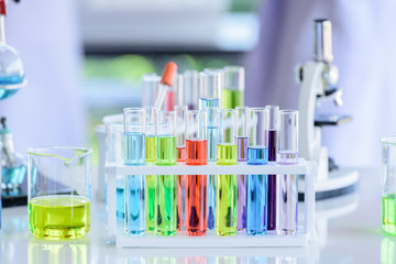 Set of laboratory glassware with colorful in test lab room.
