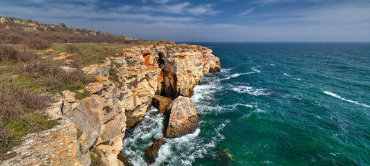 Beautiful landscape with blue sea and rocky shore - panoramic view