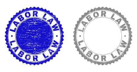 Grunge LABOR LAW stamp seals isolated on a white background. Rosette seals with grunge texture in blue and grey colors. Vector rubber stamp imitation of LABOR LAW tag inside round rosette.