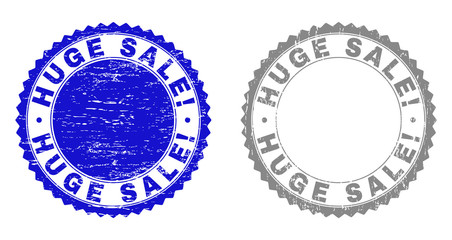 Grunge HUGE SALE! watermarks isolated on a white background. Rosette seals with grunge texture in blue and grey colors. Vector rubber stamp imitation of HUGE SALE! label inside round rosette.