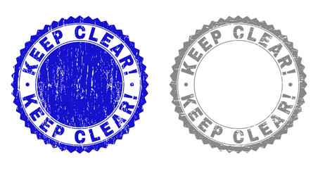 Grunge KEEP CLEAR! stamp seals isolated on a white background. Rosette seals with grunge texture in blue and gray colors. Vector rubber stamp imprint of KEEP CLEAR! caption inside round rosette.