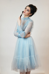 gorgeous girl takes care of her face, close up photo. studio shot.