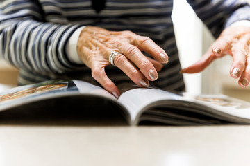 Grandmas describing something with her hands.