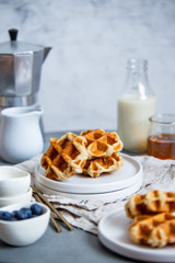 Sweet Homemade Belgian Waffle with Berry and vegan oat milk
