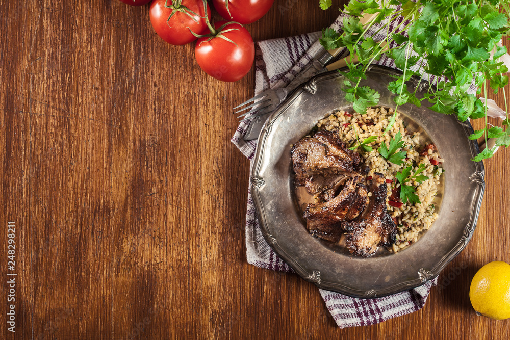 Wall mural roasted lamb chops served with bulgur wheat