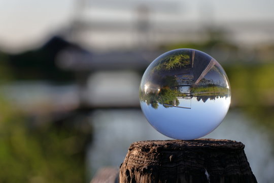 Dutch bridges through the eyes of glass ball