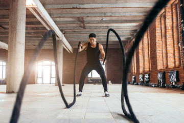 havy rope training. rope movement. core strength and stability. guy burns fat, activates the deep...