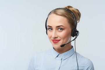 Happy smiling cheerful support phone operator portrait in headset
