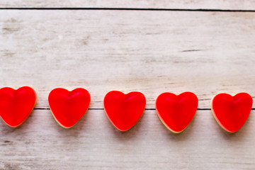 Jelly hearts on the wooden background. Valentine Day Concept.