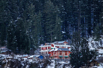 Snow covered houses in kasol village ,himachal pradesh ,India 