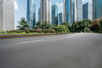 Obraz premium Highway Road and Skyline of Modern Urban Buildings in Shanghai..