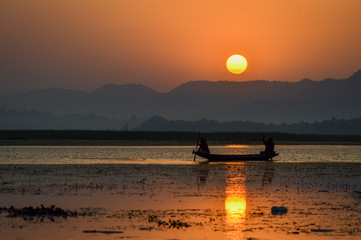 Boating at the sunrise 