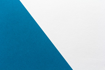 colored minimalistic diagonal background of white and blue paper