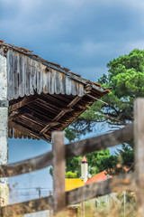 Detailed view of a older extension traditional roof on a abandoned train station building