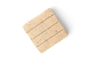 Halva with peanut isolated on white background.