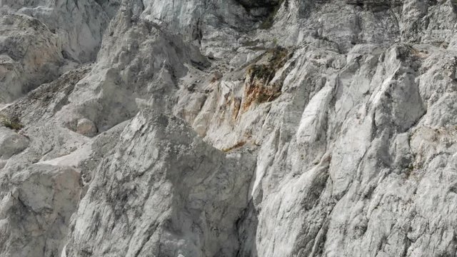 Aerial View Panning Over Steep White Rocky Landscape