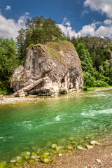 Bue and cold stream Bialka in the mountains, Poland