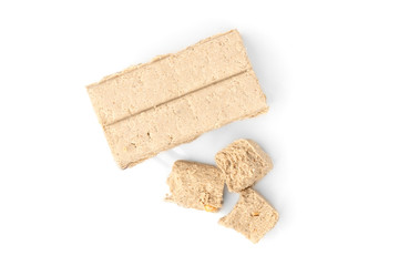 Halva with peanut isolated on white background.