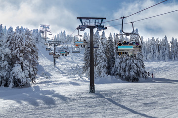 Winter ski resort,ski lift. Uludag Mountain, Bursa, Turkey - obrazy, fototapety, plakaty