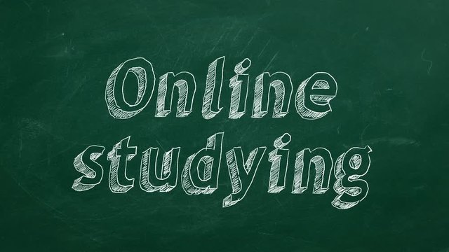 Hand drawing "Online studying" on green chalkboard
