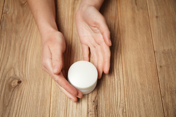 Frostbite of hands in cold. Red irritation on skin of hands. Moisturizing Cream.