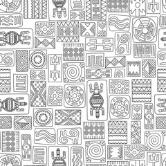 African ethnic seamless pattern. Hand drawn tribal symbols in African style on a white background. Vector illustration.