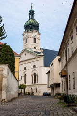 Fototapeta na wymiar Historic Hungarian city views of Gyor, with churches old lanterns and Szechenyi Square