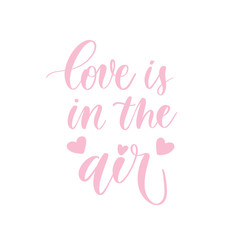 Obraz premium Love is in the air - pink hand lettering card with hearts. Vector illustration.Calligraphy inscription.