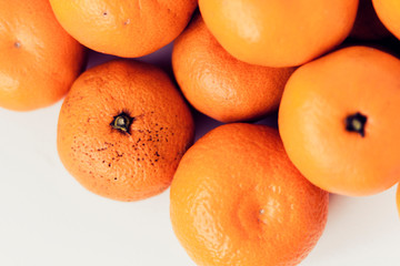 Fresh whole mandarin oranges background , top view.