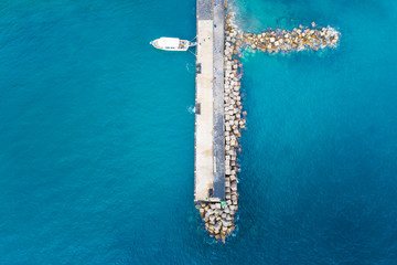 aerial view to speed boat and pier on Amalfi coast in Italy