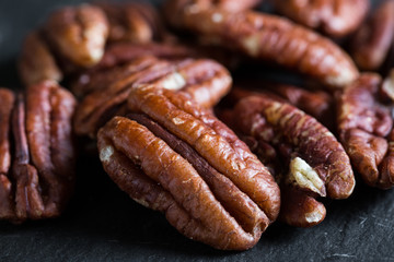 pecan closeup on dark background