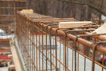 Construction of a new building, binding of reinforcement