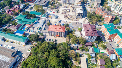 New multi-storey residential building on the shore of the beautiful Gelendzhik Bay. Black sea coast of the Caucasus, resorts of Kuban. Another residential complex is being built nearby