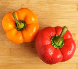 Bulgarian sweet pepper and dill on the table.