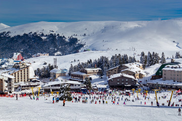 Winter ski resort,ski lift,people skiing. Uludag Mountain, Bursa, Turkey