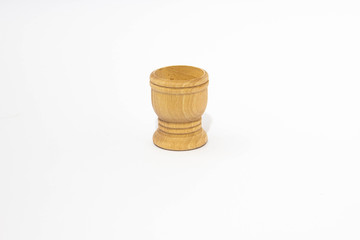 Small wooden bowl on white background
