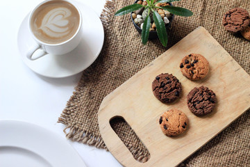 Coffee and Chocolate chip cookies bakery on Butcher Wood and Sack white background