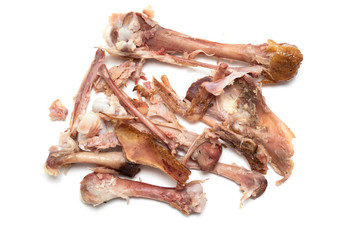 chicken bones after eating on a white background