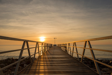 Fototapeta premium Walkway to the lookout on chilches beach at sunrise