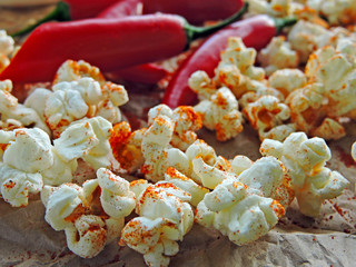 Spicy hot popcorn with chili pepper. Vegan snack