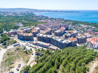 Construction of residential high-rise buildings in Gelendzhik on the shore of Gelendzhik Bay. At the foot of the Caucasus mountains on the Black sea in the resort town of Gelendzhik 