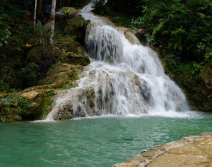 beautiful waterfalls flowing from springs in the forest